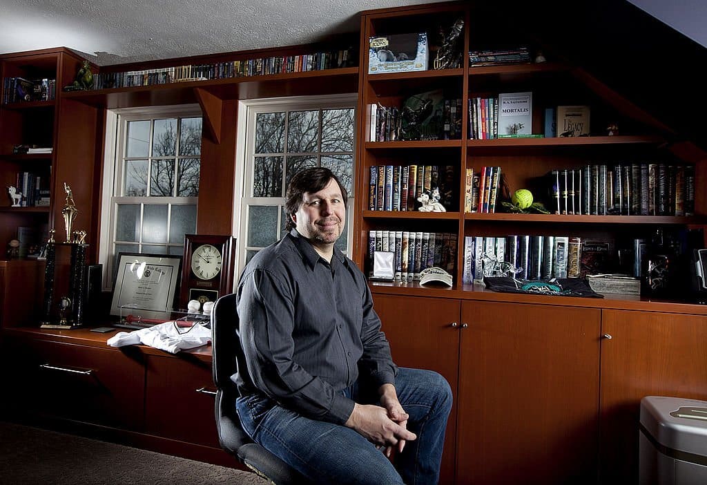 Author Bob Salvatore in front of his books