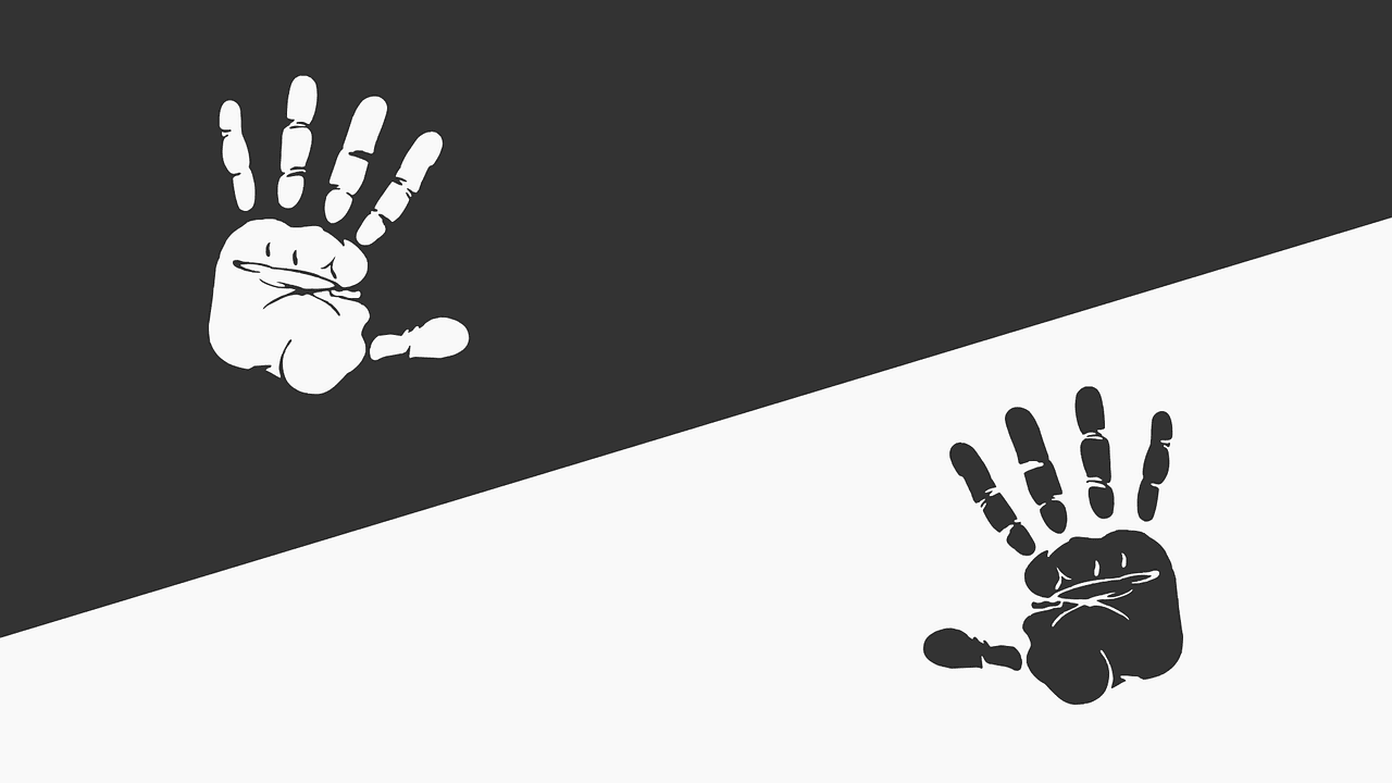 Black and white hands symbol to stop racism